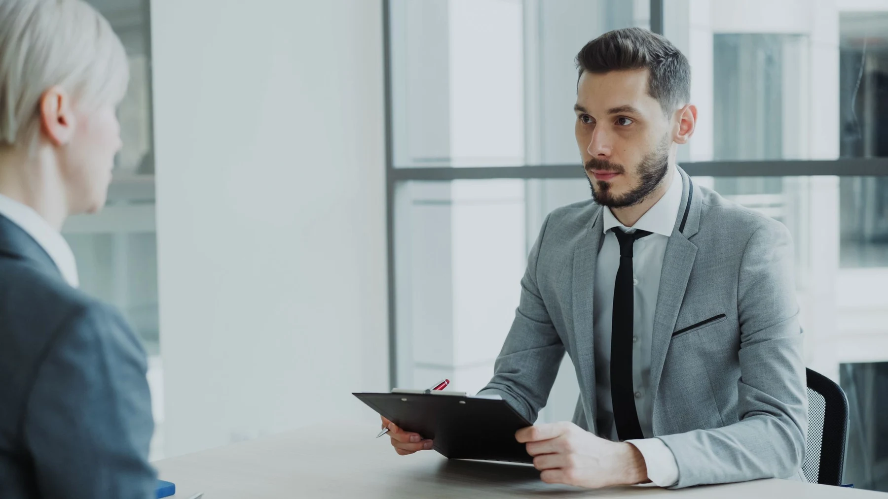 Professionals in conversation during a business meeting